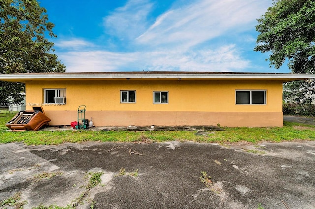 view of home's exterior featuring cooling unit