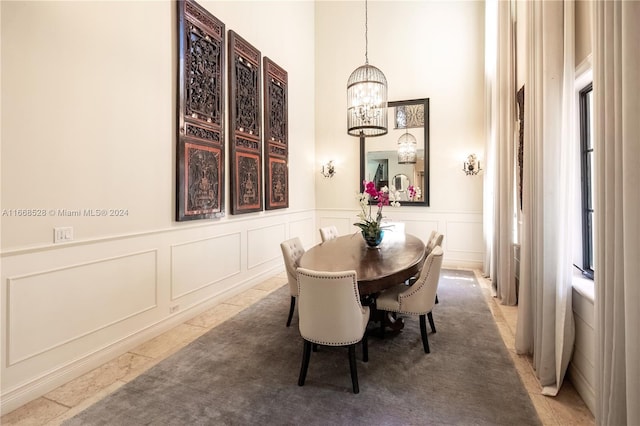 dining room with a chandelier