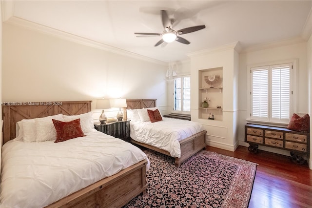 bedroom with ceiling fan, ornamental molding, dark hardwood / wood-style flooring, and multiple windows