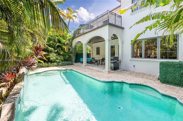 view of pool featuring a patio