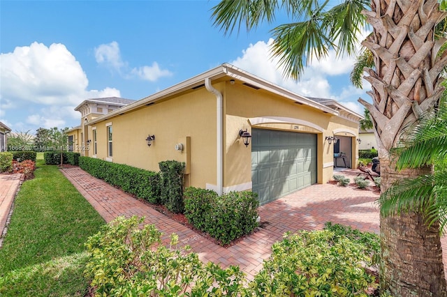 view of property exterior with a garage