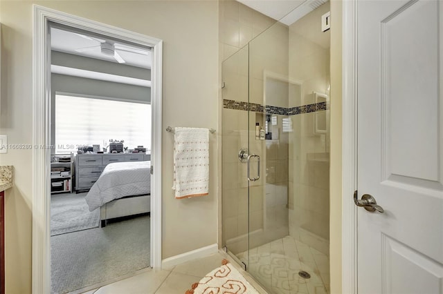 bathroom featuring tile patterned floors and a shower with door