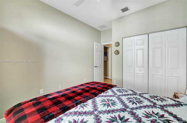 bedroom featuring ceiling fan and a closet