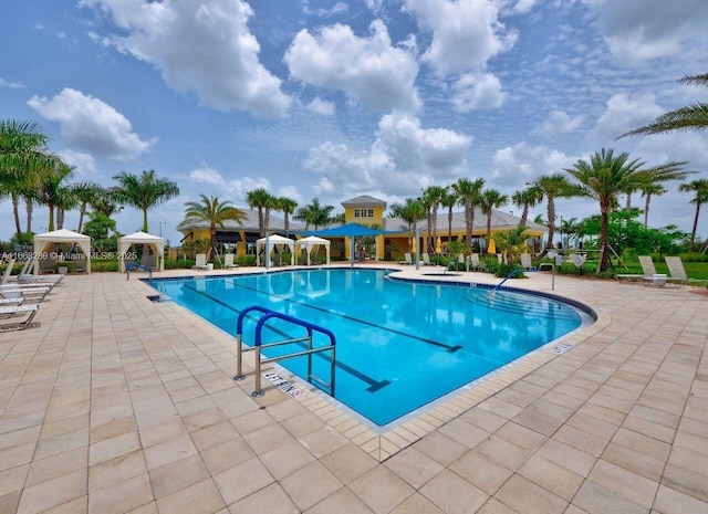 view of pool featuring a gazebo and a patio area