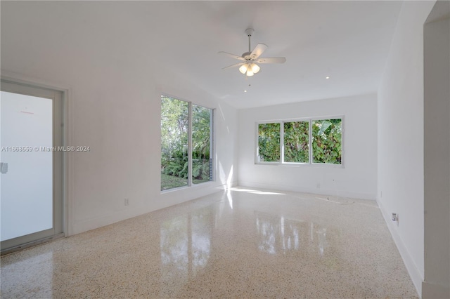 spare room with ceiling fan