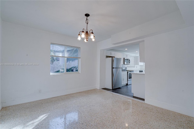 interior space with a notable chandelier