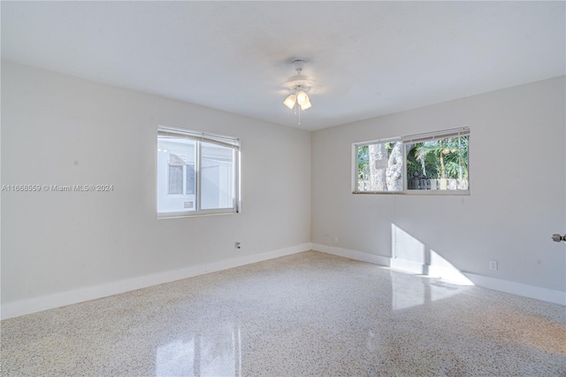 empty room with ceiling fan