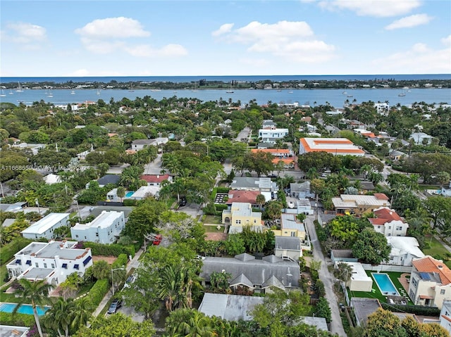 birds eye view of property featuring a water view