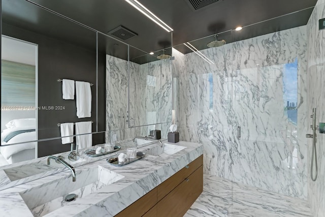 bathroom featuring vanity, tile walls, and tiled shower