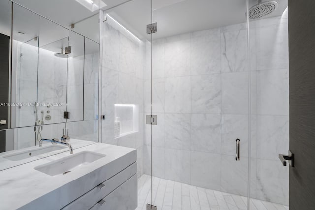 bathroom featuring vanity and walk in shower