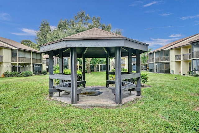 surrounding community featuring a lawn and a gazebo