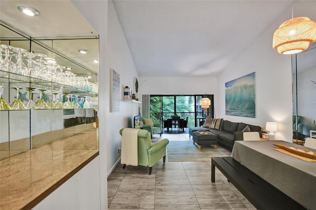 living room with vaulted ceiling