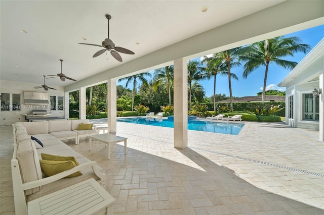 view of pool with a patio, an outdoor hangout area, area for grilling, and ceiling fan