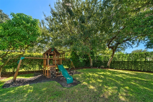 view of jungle gym featuring a yard