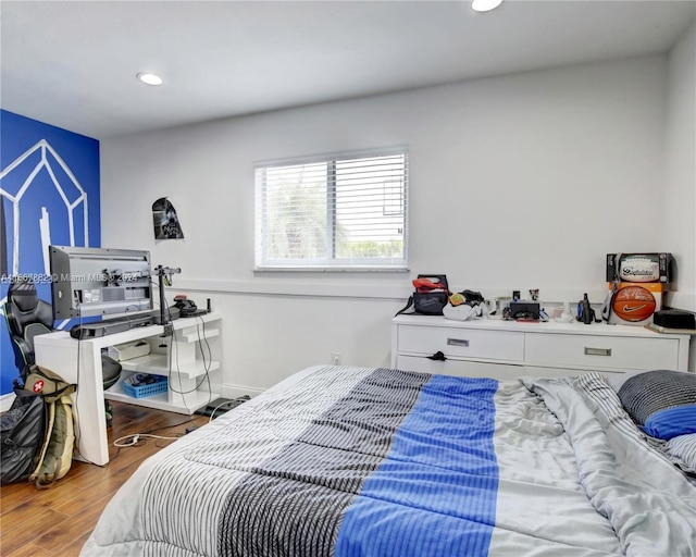 bedroom featuring hardwood / wood-style floors