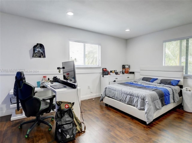 bedroom featuring dark wood-type flooring