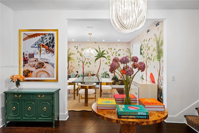 interior space featuring baseboards, an inviting chandelier, and dark wood finished floors