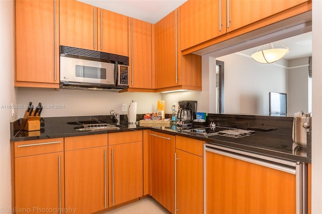 kitchen with dark stone countertops