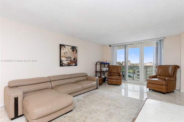 3800 S Ocean Dr Unit 811, Hollywood, FL 33019 - living room featuring a wall of windows