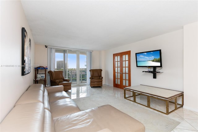 3800 S Ocean Dr Unit 811, Hollywood, FL 33019 - living area featuring tile patterned floors and french doors