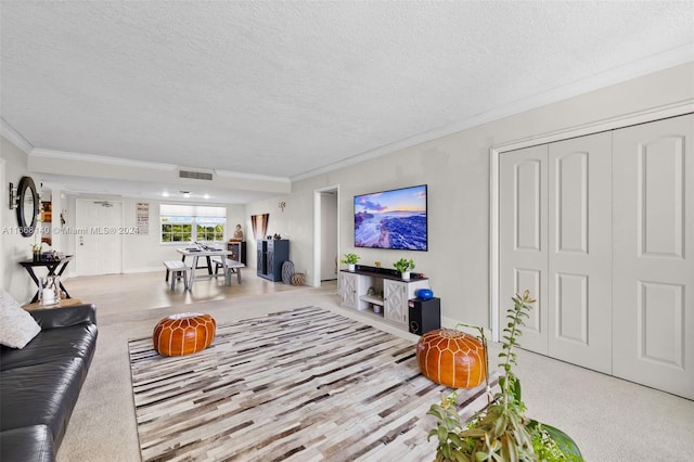 living room with light carpet, a textured ceiling, and ornamental molding