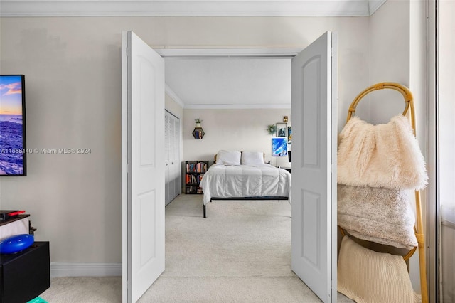 carpeted bedroom with crown molding