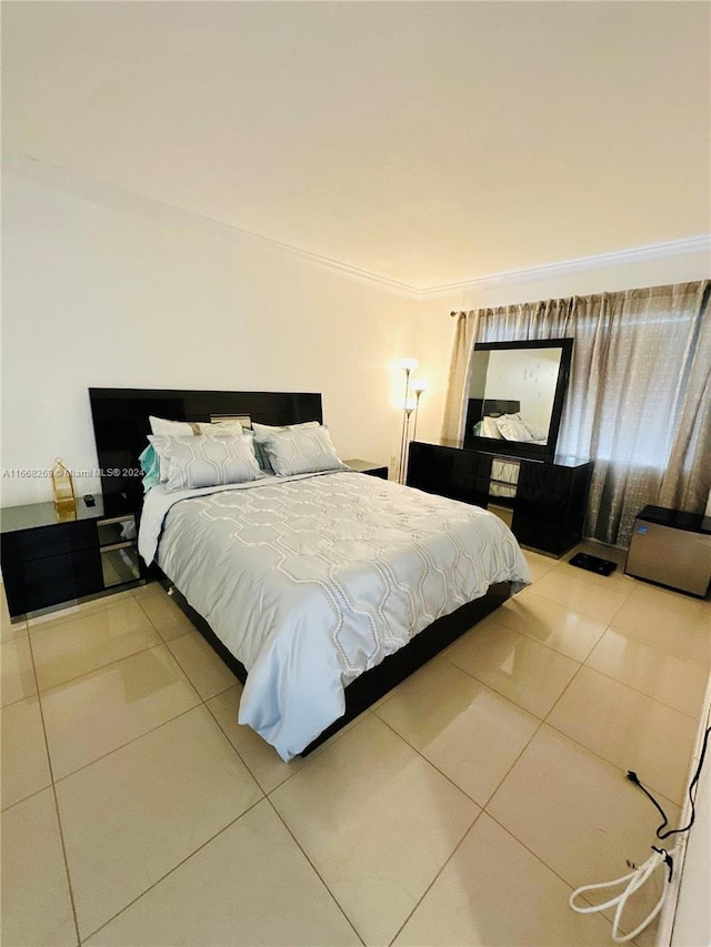 tiled bedroom featuring crown molding