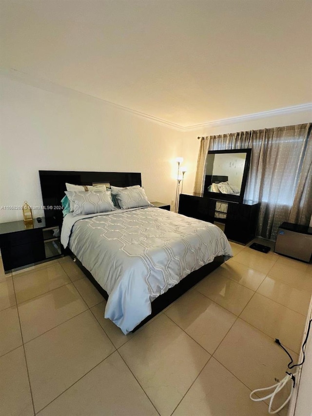 tiled bedroom featuring crown molding