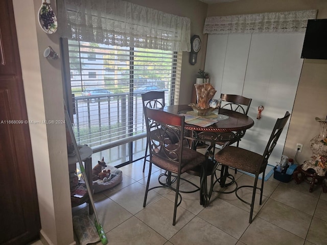 dining room featuring light tile patterned floors