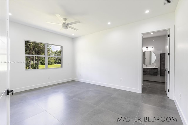 empty room featuring ceiling fan