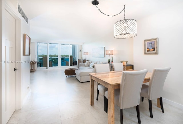 dining room featuring expansive windows