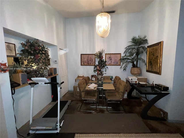 dining room with a chandelier