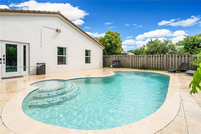 view of swimming pool featuring a patio