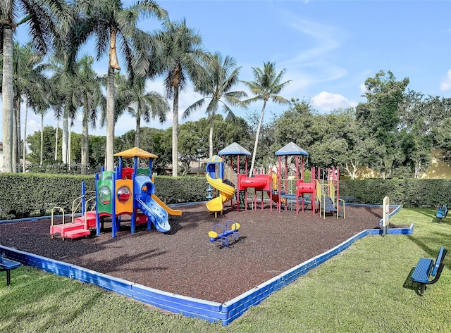 community playground featuring a yard