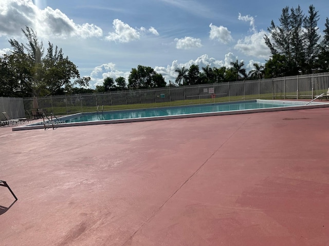 community pool with fence