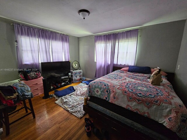 bedroom featuring hardwood / wood-style flooring