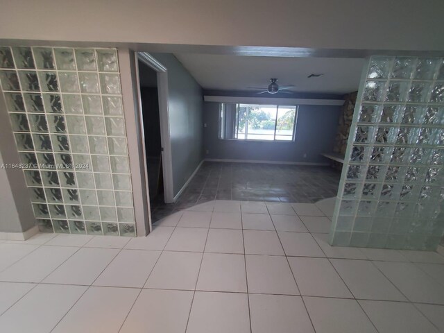 bathroom featuring tile patterned floors and ceiling fan