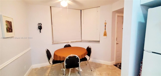 dining area featuring ceiling fan