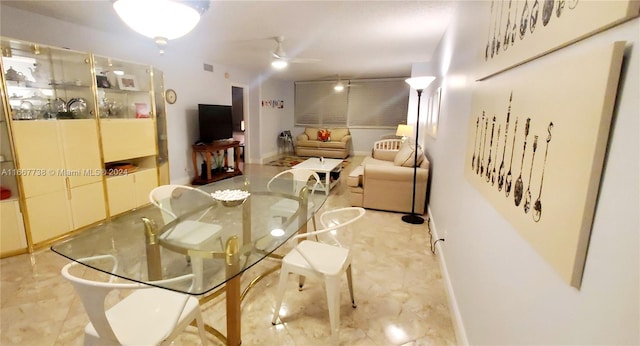 dining room with ceiling fan