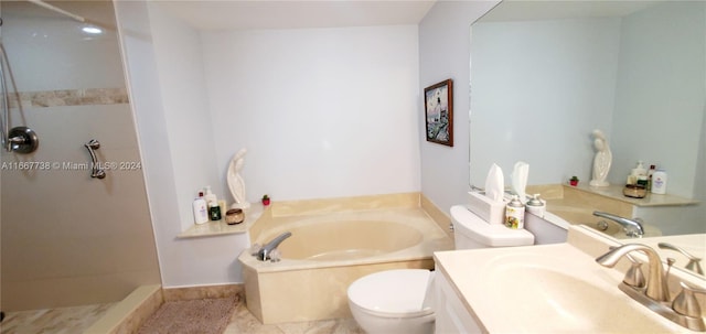 full bathroom with vanity, shower with separate bathtub, and toilet