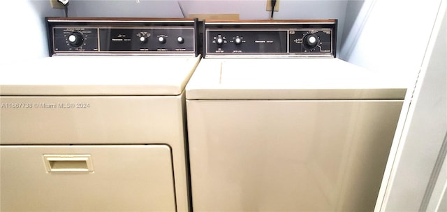 laundry room with independent washer and dryer