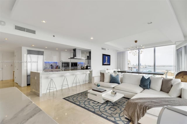 living room featuring a chandelier