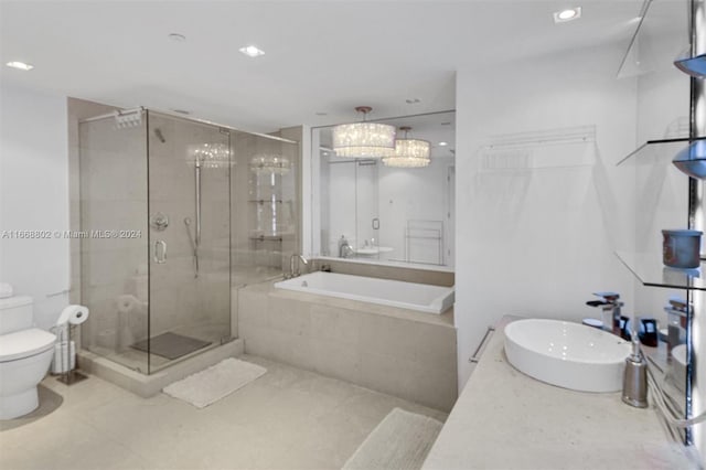 full bathroom with separate shower and tub, vanity, and toilet