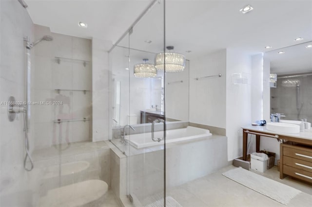 bathroom with vanity, plus walk in shower, and tile patterned floors