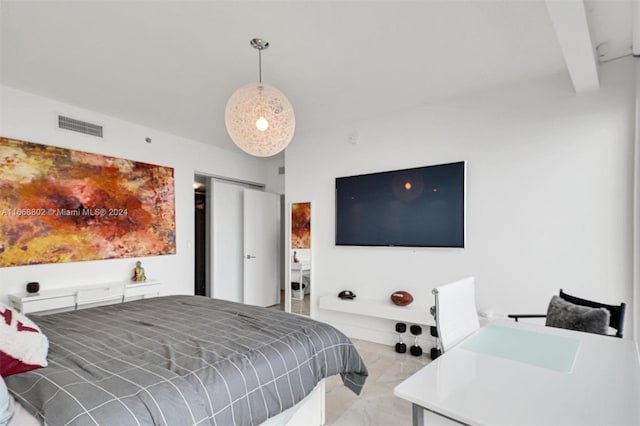 bedroom with beam ceiling