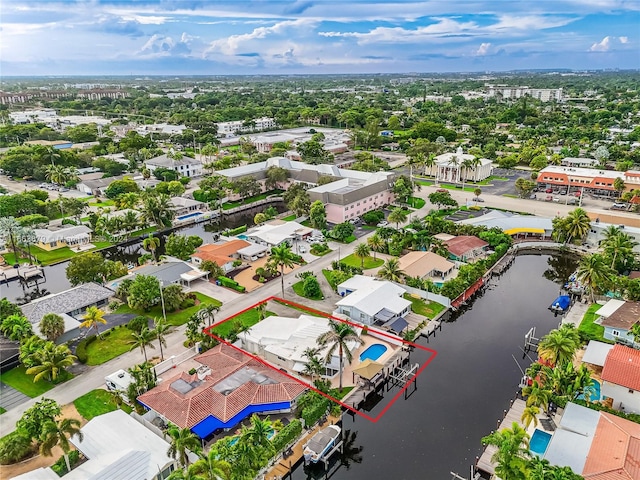 bird's eye view with a water view