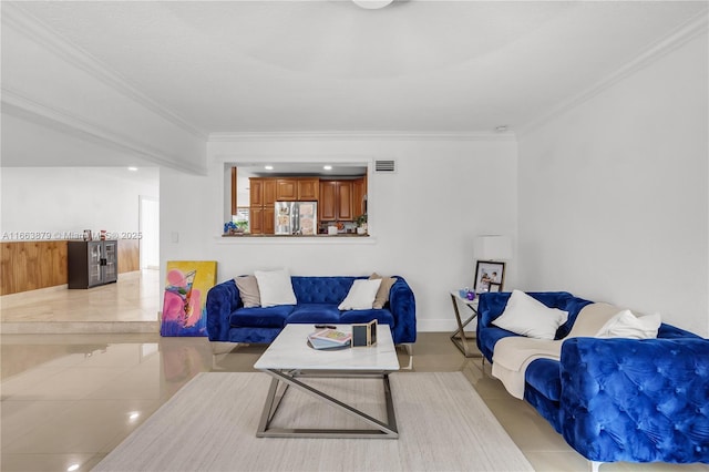 tiled living room with ornamental molding