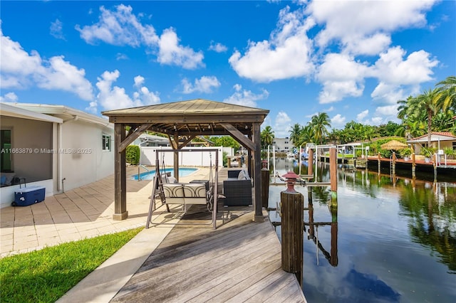 dock area featuring a water view