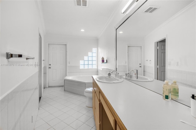 bathroom featuring a tub to relax in, tile patterned floors, vanity, tile walls, and ornamental molding