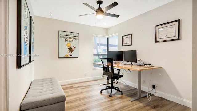 office space featuring hardwood / wood-style floors and ceiling fan